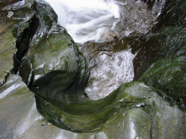 [Photo of a water carved rock]