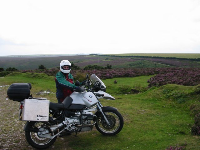 [Photo of Kate and her bike on Exmoor]